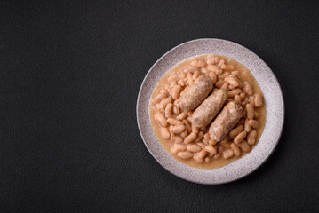 Cassoulet with white beans, meat and sausages, vegetables, salt and spices