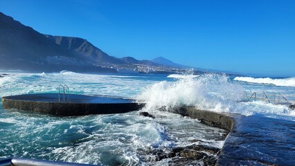 waves crashing on the rocks