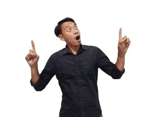 Shocked young Asian man in casual shirt pointing finger aside at copy space isolated on white background. Great offer concept