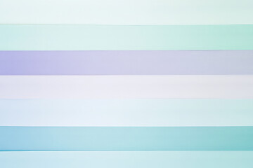 Fototapeta premium A soft, gradient background with thin horizontal stripes in pastel shades of lavender, mint green, and baby blue. The gentle transitions between the colors create a calm, serene design perfect for a