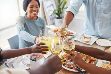 Hands of family, food or toast with glasses for meal, dining or thanks giving dinner with drinks. Top view, parents or kids in home for bonding, event or feast together on holiday, weekend or lunch