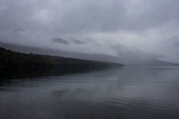 Cloudy and foggy view of Lake Rotoiti, New Zealand.