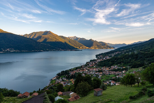View of Lake Como, towards the south, from Musso, with the overhanging mountains, Dervio, the roads and the towns bordering the lake.
