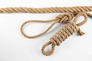Hemp ropes on white background, top view