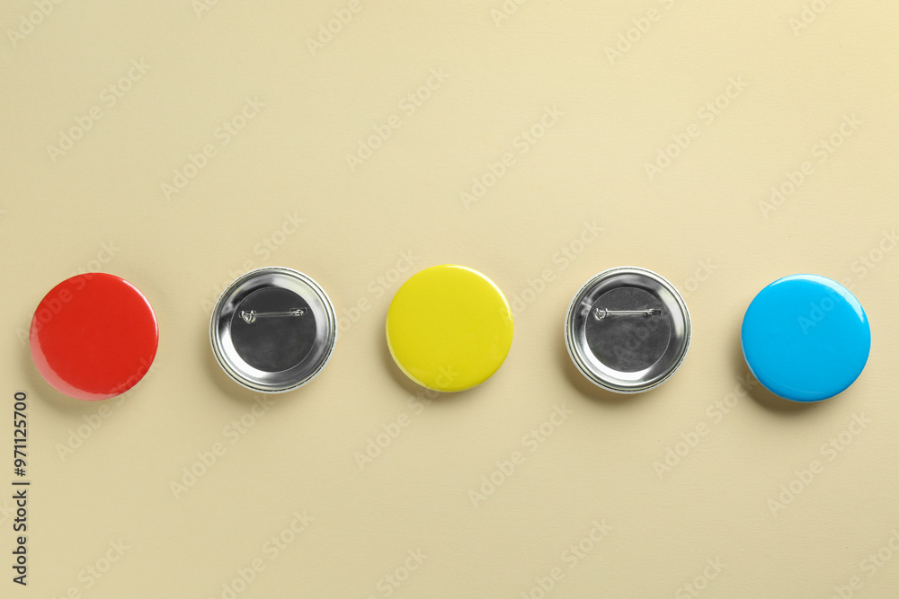 Sticker Colorful button badges on beige background, flat lay. Mockup for design