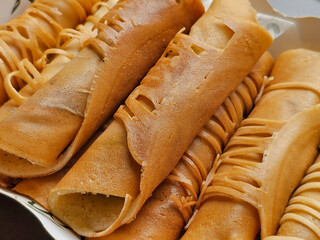 Close up. Mini Pancake Rolls or Tokyo dessert is the name of a Thai dessert. Tokyo dessert on packaging