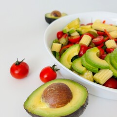 Avocado, Corn and Tomato Salad with Pepper Served on Plate