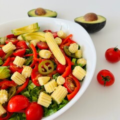 Avocado, Corn and Tomato Salad with Pepper Served on Plate