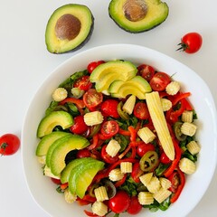 Avocado, Corn and Tomato Salad with Pepper Served on Plate