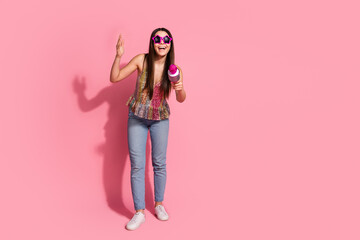 Full length photo of shiny attractive lady dressed singlet holding mic empty space isolated pink color background