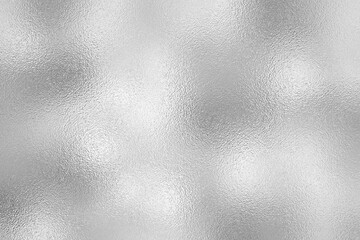 Silver foil with frosted glass texture, shiny and glossy glitter background for fabric, surface, pattern, print art design.