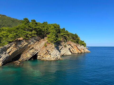 Adriatic sea and scenic layered rocks 