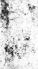 Fototapeta premium A black and white photo of a wall with a lot of dirt and grime