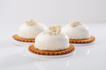 Lot of sugar. Sweet cakes on the white surface