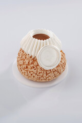 Sweet cake on the white surface