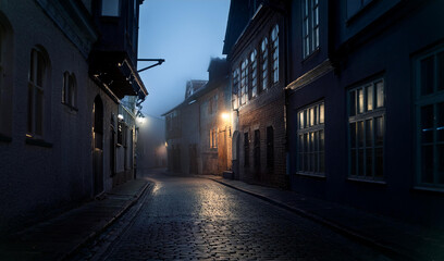 Obraz premium dark London street, Victorian style buildings, lots of shadows, dim light from street lamps