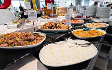 A variety of salads and meats. All-inclusive concept.