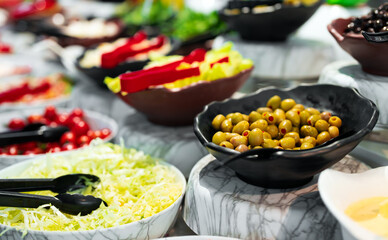 Chopped vegetables and vegetable salads. All-inclusive concept.