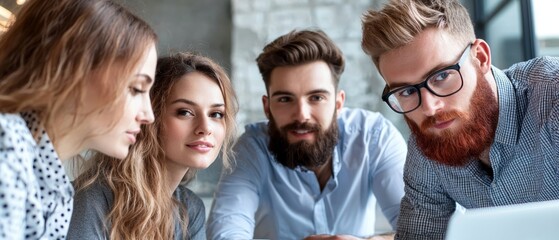 Fototapeta premium Diverse group of people negotiating in a formal office space, with laptops and documents, business discussion, team-based negotiation