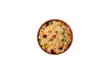Boiled wheat bulgur porridge with vegetables peppers, peas, corn