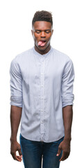 Young african american man over isolated background sticking tongue out happy with funny expression. Emotion concept.