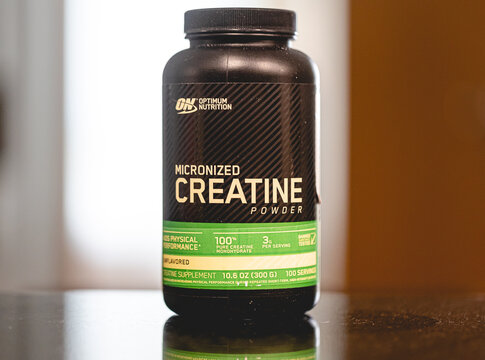 A pot of creatine from the Optimum Nutrition brand.
