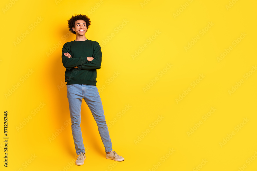 Poster full body portrait of nice young man crossed arms look empty space wear sweater isolated on yellow c