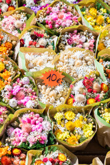 Vintage flowers market on public street - retro cottagecore style.