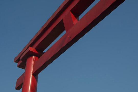Torii. Traditional Japanese gate. Entrance to a sacred space. In the background the blue sky. Liberdade neighborhood, S&atilde;o Paulo, Brazil.