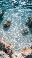 Clear Turquoise Water Gently Rippling Over Rocks in a Serene Coastal Environment