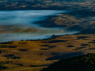 Misty Valley with Rolling Hills Aerial View