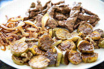 Traditional, strong and nutritious real food, liver with okra and onion