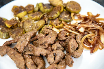 Traditional, strong and nutritious real food, liver with okra and onion