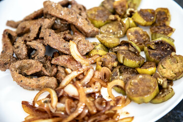 Traditional, strong and nutritious real food, liver with okra and onion