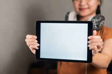Young Woman Holding a Blank Tablet