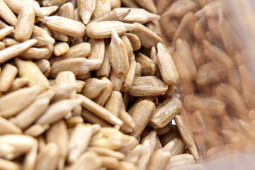Peeled sunflower seeds in plastic package. Packaging market groceries