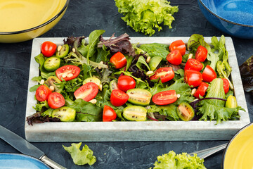 Fresh green salad with cherry tomatoes.