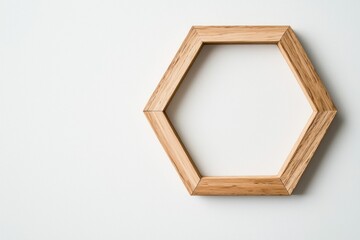 Hexagonal wooden frame with a geometric design, isolated on white