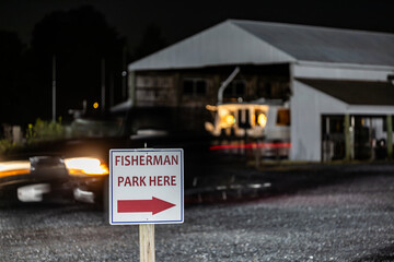 Solomons, Maryland USA  A view of the marina at night with boats.