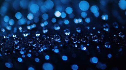 Blue Water Droplets on a Dark Surface