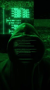 Hacker with hoodie and glitch face. Computer abstract digital code at the background. Dark web or darknet fraud. Cryptocurrency bitcoin mixer concept. Cybersecurity and social network data protection