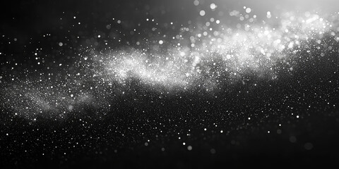 Abstract background with white and gray glitter.