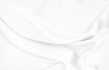 White gray satin texture that is white silver fabric silk background with beautiful soft blur...