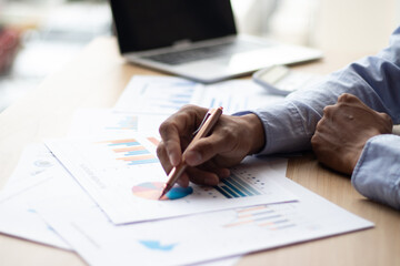 A businessman is analyzing his company's profits with a success graph that he has plotted.