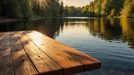 A wooden table top overlooking a serene lake, with the warm sunlight filtering through the trees and casting a golden glow on the surface.