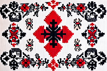 
Ukrainian ornament, with red and black color embroidered crosses a white background