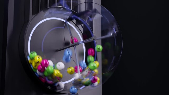 Closeup of Lottery Drawing Machine. Lottery ball machine with Colorful Lotto balls.	