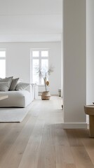 Minimalist and Serene Living Space with Hardwood Floors and Natural Lighting