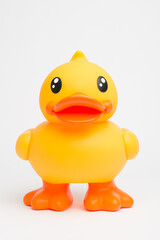 Rubber, duck and object in studio for bath, playing and children entertainment with fun squeaky sound. Plastic bird, toy and white background for kids, pool and water with childhood games or activity