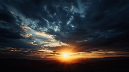  The sun sets over an expansive horizon, encompassing a large stretch of land